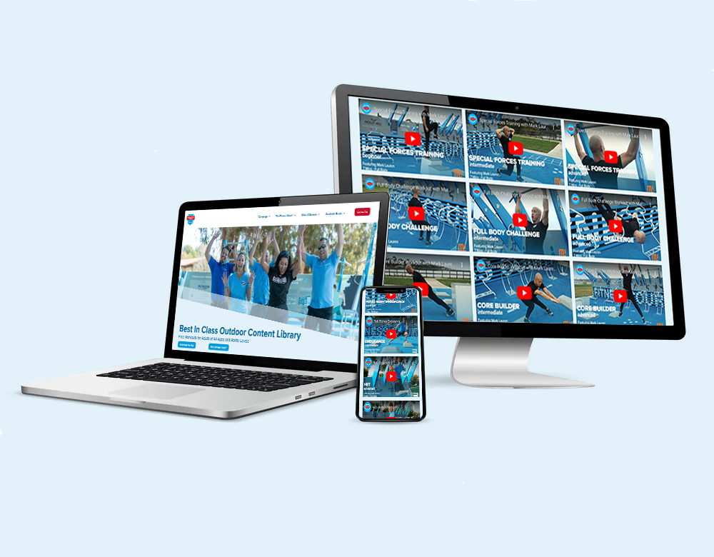 phone, laptop and monitor displaying workout library